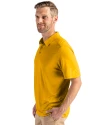 Side profile view of a man wearing a College Gold Cutter & Buck Coastline Epic Comfort Eco Recycled Mens Polo Thumbnail Image