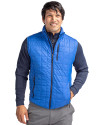 Front profile view of a man wearing a Royal Cutter & Buck Rainier PrimaLoft® Mens Eco Insulated Full Zip Puffer Vest Thumbnail Image