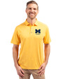 Michigan Wolverines Alumni Cutter & Buck Forge Eco Stretch Recycled Mens Polo College Gold Heather Front
