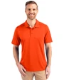 Front profile of a man wearing a College Orange Cutter & Buck Prospect Eco Textured Stretch Recycled Mens Short Sleeve Polo