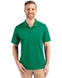 Front profile of a man wearing a Kelly Green Cutter & Buck Prospect Eco Textured Stretch Recycled Mens Short Sleeve Polo