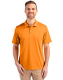 Front profile of a man wearing an Orange Burst Cutter & Buck Prospect Eco Textured Stretch Recycled Mens Short Sleeve Polo