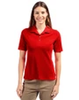 Front profile of a woman wearing a Red Cutter & Buck Virtue Eco Pique Recycled Womens Polo