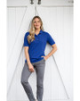Woman wearing a Tour Blue Cutter & Buck Virtue Eco Pique Recycled Womens Polo