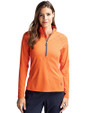 Front profile of a woman wearing a College Orange Cutter & Buck Adapt Eco Knit Stretch Recycled Womens Half Zip Pullover