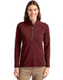 Front profile of a woman wearing a Bordeaux Cutter & Buck Adapt Eco Knit Stretch Recycled Womens Half Zip Pullover