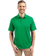 Front profile of a man wearing a Kelly Green Cutter & Buck Virtue Eco Pique Recycled Mens Polo
