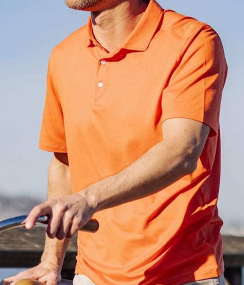 Man Wearing Orange Polo Shirt