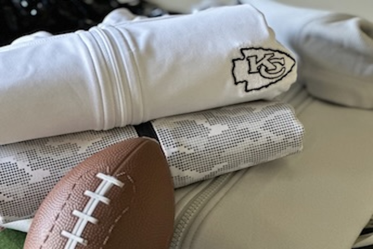 Two sweatshirts from Cutter & Buck's Monochrome NFL apparel collection A