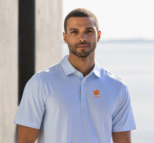 Man wearing Clemson Alumni polo