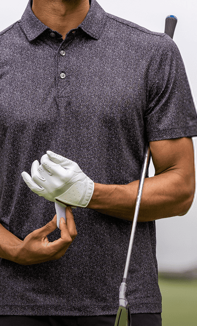 Man In Golf Polo Fixing Glove