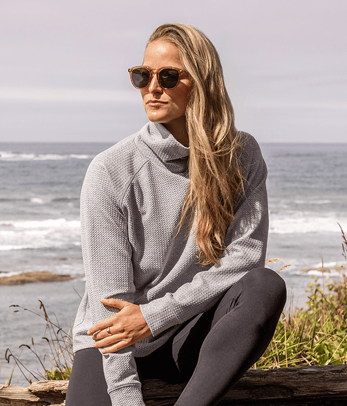 Woman wearing light gray textured sweater
