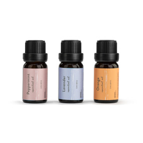 A set of three essential oils, placed in a small black bottle, each with a different colored label. One orange, one lavender, one peppermint.