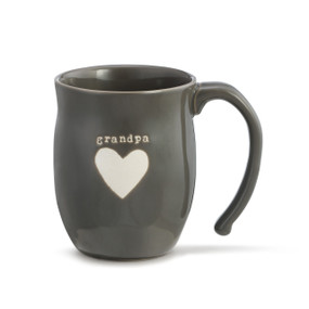 A dark gray coffee mug with "grandpa" engraved above a white heart.