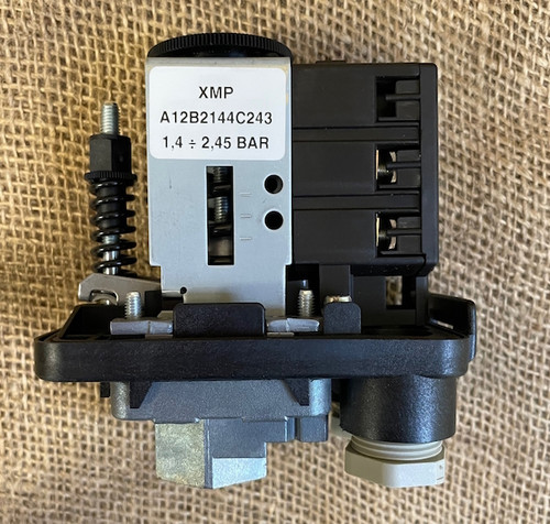 Side view of the Telemecanique XMPA12B21442 pressure switch showing the main adjustment wheel and the smaller adjustment for the differential.