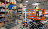 Rolling Ladder vs. Lift: Which Is Better for Your Facility?