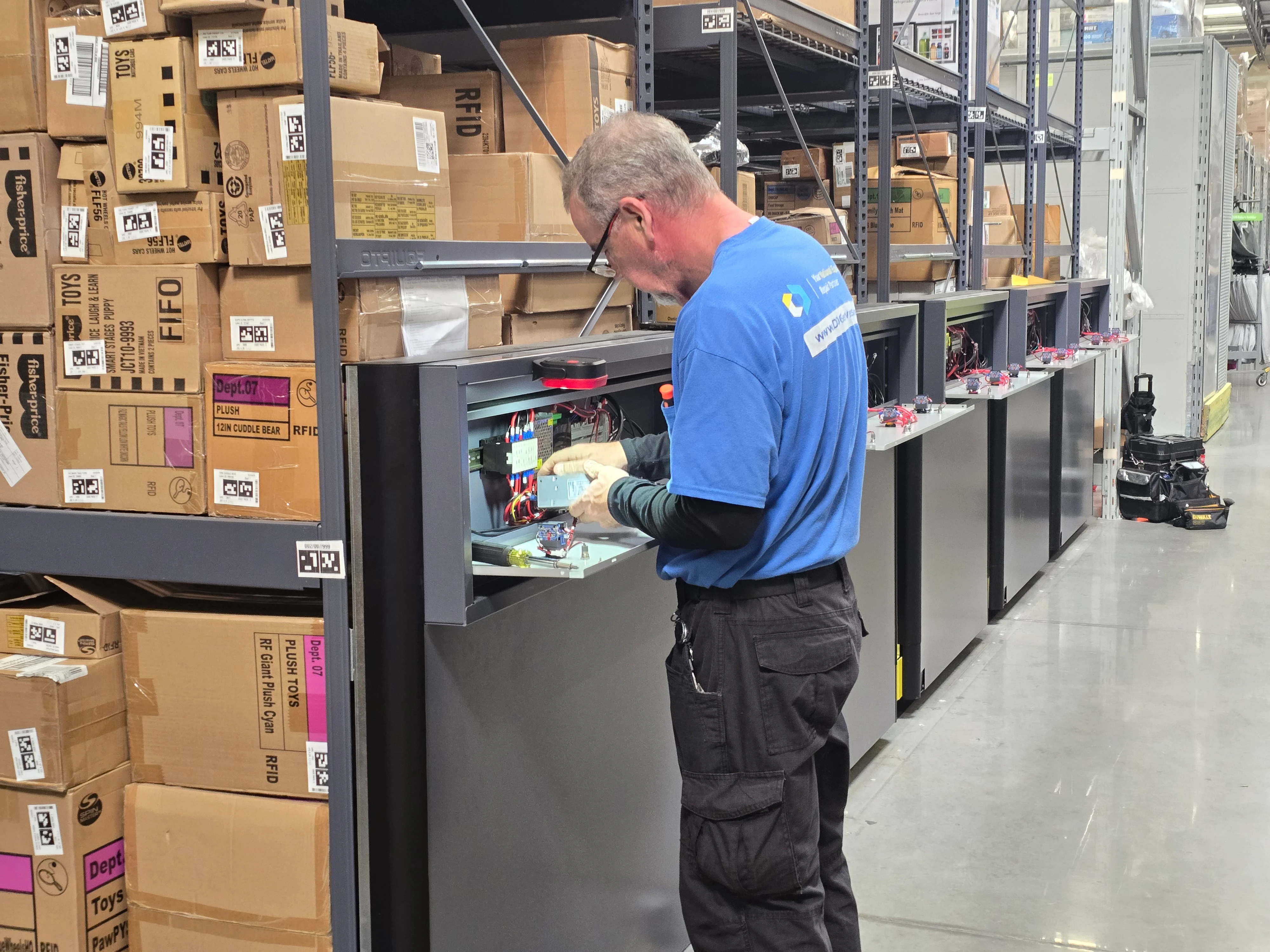 DOC Services technician installing SmartRack mobile aisle system