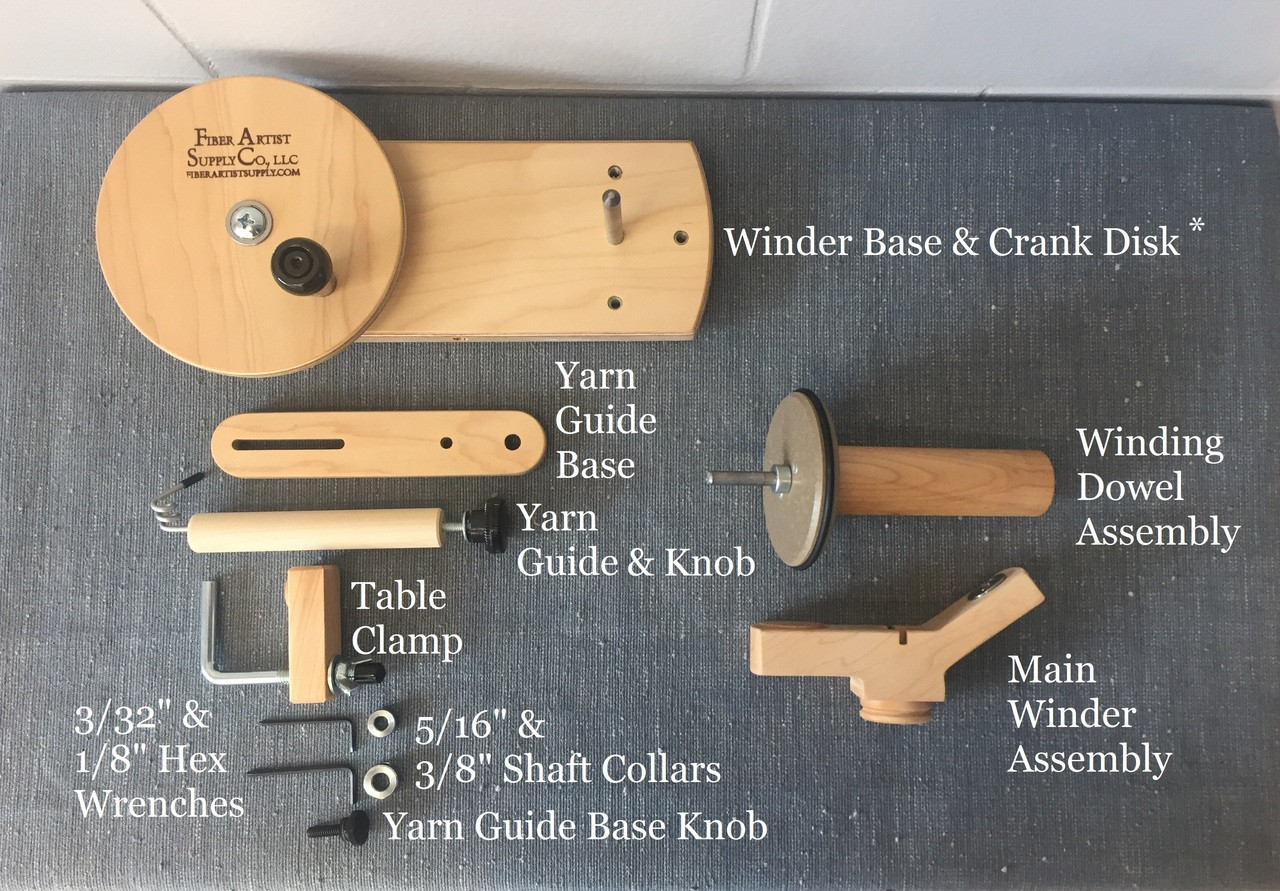 Wooden yarn winder with screw clamp.