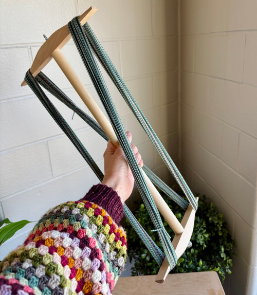 Hard maple 2-yard skein niddy noddy designed for winding and measuring yarn for spinning, weaving, and dyeing.