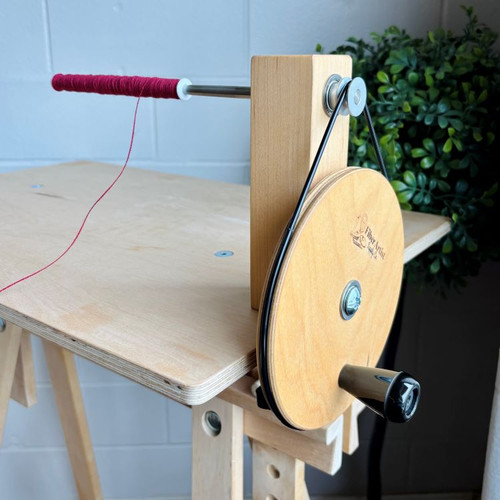 Weaver’s bobbin winder for smooth and efficient yarn winding. Compatible with standard weaving bobbins, this durable and easy-to-use tool helps fiber artists quickly prepare yarn for looms. Perfect for handweaving, weaving projects, and fiber craft enthusiasts.