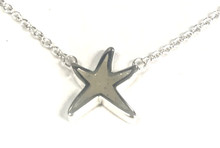 Sterling Silver delicate dancing starfish necklace with Siesta Key Beach Sand SAND942 Available at Silver City Sarasota.