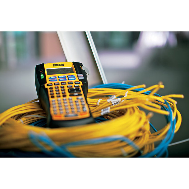 DYMO Rhino 5200 industrial label maker on cable installation site