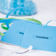 Blue gift bags and stationery items labelled with clear LetraTag plastic tape