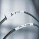 Printed heat shrink tube labels fitted onto electrical wires