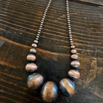 GRADUATED COPPER PEARLS 