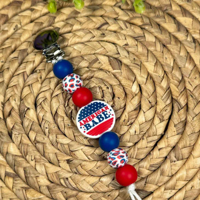 PACI CLIP AMERICAN BABE