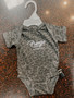 FRINGE BLACK LEOPARD ONESIE