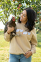 FLUFFY WHITE CHICKEN WOMEN'S TAN CREWNECK