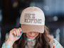 HE'S ROPING TRUCKER HAT - KHAKI