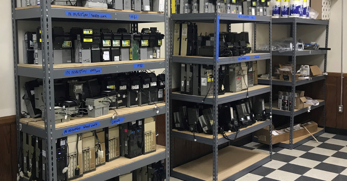 ASI inventory shelves stocked with genuine vending machine spare parts and payment components
