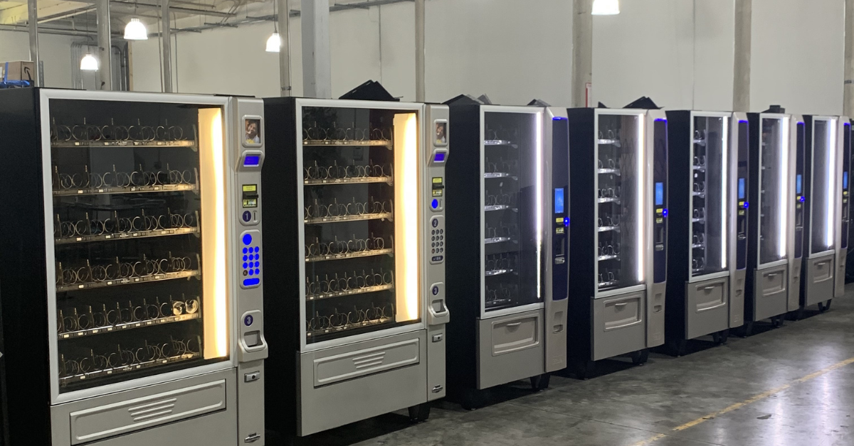 Row of reliable commercial vending machines ready for deployment, illustrating dependable equipment that helps operators maintain a stable vending route.