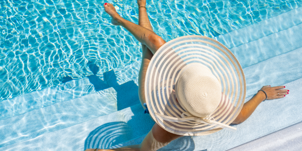 Poolside summer setting representing seasonal refreshment and vending machine demand
