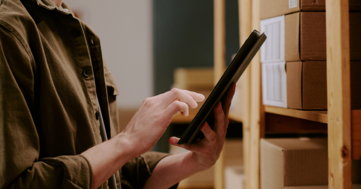 Operator using a tablet to monitor vending machine telemetry and track inventory levels