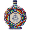 Immerse yourself in the exquisite taste and rich cultural heritage of Mandala Extra Añejo Arte Huichol. This extraordinary tequila is a celebration of craftsmanship, aged to perfection to deliver a smooth and complex flavor profile. Encased in a stunning bottle adorned with intricate Huichol art, each bottle is a masterpiece, reflecting the vibrant traditions of the Huichol people.