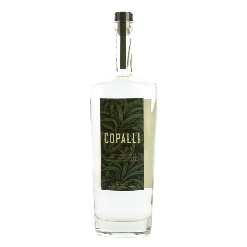 Made from organic, heirloom sugarcane grown on Copal Tree Farms in Belize. Distilled with 100% canopy water from the surrounding jungles, collected by a water catchment system. It is a blend of pot and column still distillation. This is a zero-impact distillery. This rum is great on its own and also makes a killer daiquiri.