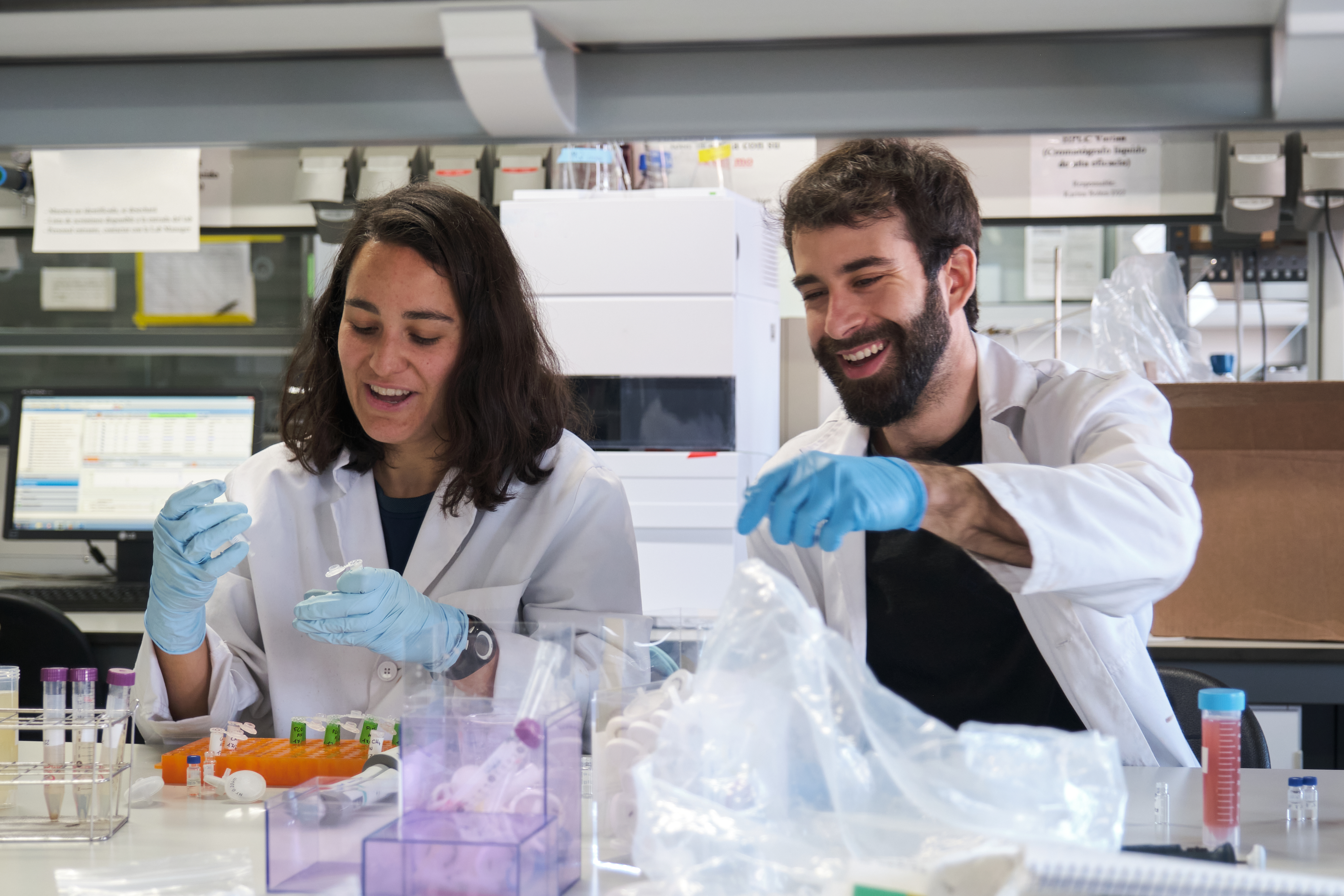 two-young-phd-students-working-in-a-real-laborator-2022-09-05-22-36-41-utc.jpg