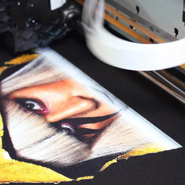 Direct to Garment has full color photo quality images. Single piece orders.