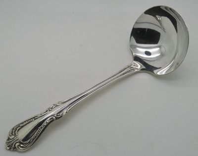 Chalice by Wm A Rogers gravy ladle