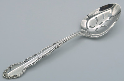 Flirtation by 1881 Rogers pierced serving spoon