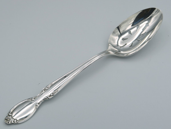 Precious Mirror pierced serving spoon
