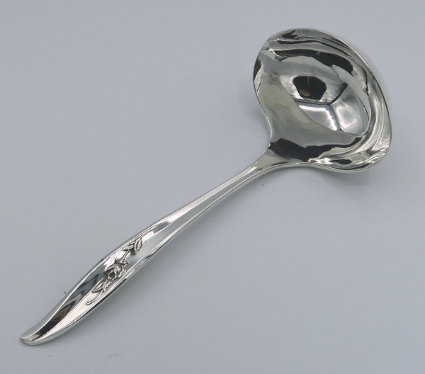 Magic Rose by 1847 Rogers Bros gravy ladle