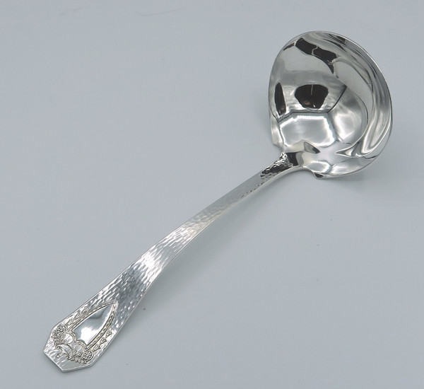 Heraldic by 1847 Rogers Bros gravy ladle