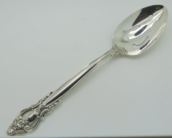 Empress pierced serving spoon