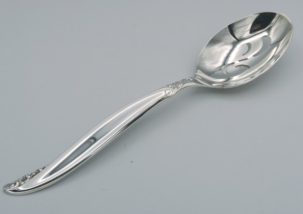 Leilani by 1847 Rogers Bros  pierced tablespoon