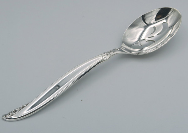 Leilani by 1847 Rogers Bros  pierced serving spoon