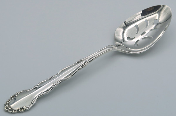 flirtation by 1881 Rogers pierced serving spoon